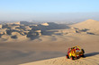 Photo: Sand Dessert with Dune Buggy Sand Dessert with Dune Buggy