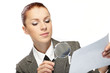 woman holding a magnifying glass in the hand woman holding a magnifying glass in the hand