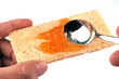 Cuiller de confiture sur la biscotte Cuiller de confiture sur la biscotte