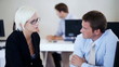 Business people planning schedule with team discussing