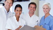 Portrait of confident medical team smiling together