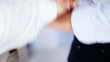 business overlapping hands to show unity