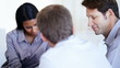 Business woman with executives in healthy discussion
