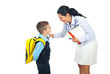 Teacher talking with schoolboy
