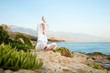 Young woman meditating outdoors