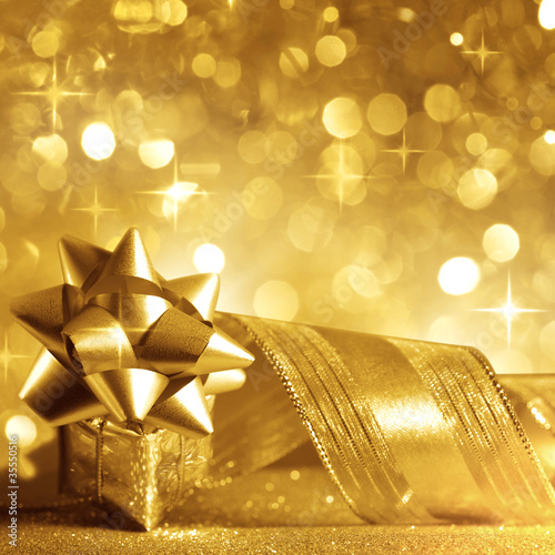 Photo: Christmas background in gold Christmas background in gold