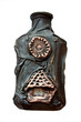 handmade bottle covered with skin on a white background