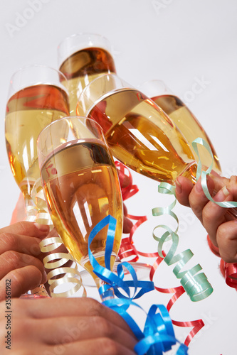 Photo: Clinking champagnes Clinking champagnes