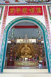 Golden Kuan Yin Statue in Temple