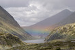 Photo: Regenbogen über Rondvassbu See Regenbogen über Rondvassbu See