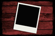 Polaroid frame over grunge wood texture