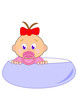 Baby girl with red bow in blue cup Baby girl with red bow in blue cup