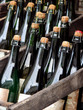 glass bottles with stoppers in a wooden box glass bottles with stoppers in a wooden box