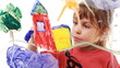 Video: Little girl paint window house in picture on glass Little girl paint window house in picture on glass