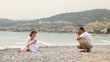 Man in shorts photographed woman on beach