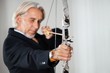 Business executive aiming at target