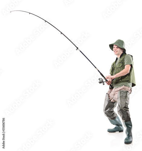 Photo: Full length portrait of a fisherman holding a fishing pole Full length portrait of a fisherman holding a fishing pole