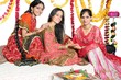 Traditional Indian ladies celebrating colors of india.