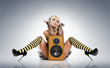 Foto: Glamour sexy young girl in headphones with speaker Glamour sexy young girl in headphones with speaker