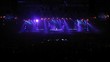 People dance to rave music in great hall