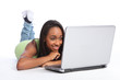 Happy African American teenager girl on internet