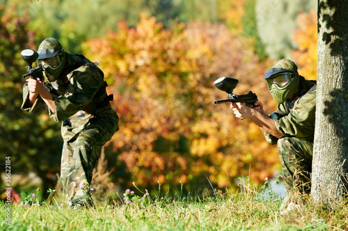 Photo: two paintball players two paintball players
