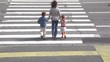 Mother and children, cross road at pedestrian crossing