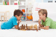 Two boys playing chess