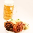 zwei Grillhaxen mit Klössen und Sauerkraut