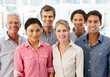 Photo: Mixed group business people in office Mixed group business people in office