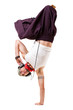 Tänzer beim einhändigen Handstand Tänzer beim einhändigen Handstand