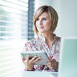 businesswoman working on her tablet computer