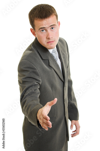Photo: Business handshake on a white background. Business handshake on a white background.
