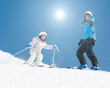 Skiing - young skiers on ski slope Skiing - young skiers on ski slope