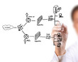 Businessman drawing a security plan for a firewall system