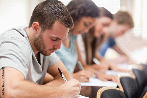 Foto: Serious students sitting for an examination Serious students sitting for an examination