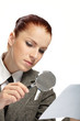 woman holding a magnifying glass in the hand woman holding a magnifying glass in the hand