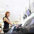 Photo: Woman on trademill in gym Woman on trademill in gym
