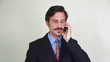 Video: Businessman talking on mobile cell phone Businessman talking on mobile cell phone