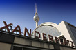 Alexanderplatz station sign and the TV Tower in Berlin Alexanderplatz station sign and the TV Tower in Berlin