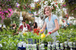 Woman Working in Greenhouse Woman Working in Greenhouse