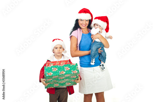 Photo: Mother with their sons at Christmas Mother with their sons at Christmas