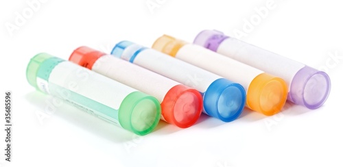 Photo: Colorful homeopathic medication containers Colorful homeopathic medication containers