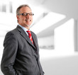 Senior businessman smiling