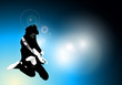 Rock guitarist jumps in the air