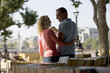 A middle-aged couple looking at books at a book stall