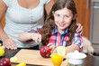Little girl cuts apple Little girl cuts apple