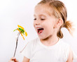 Little girl eating vegetable salad