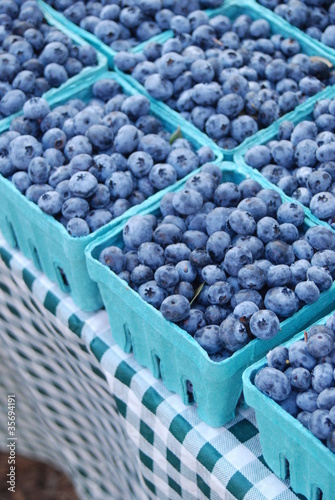 Photo: A table of organic Blueberries at a Farmer's Market A table of organic Blueberries at a Farmer's Market