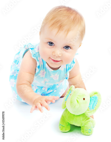 Photo: Adorable little baby girl playing Adorable little baby girl playing